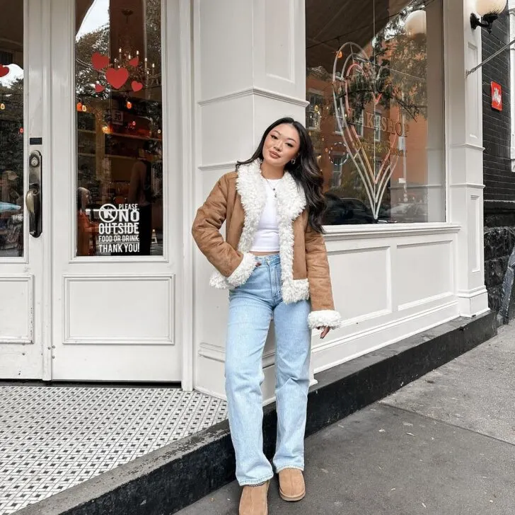Faux fur coat and jeans