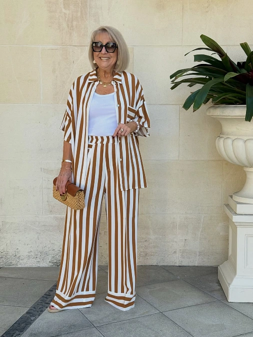 Striped shirt and wide-leg pants stylish outfit for women over 50