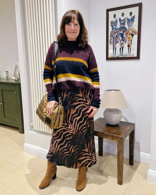 Striped knit with tiger print midi skirt stylish outfit for women over 50