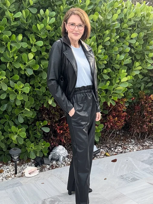 Black leather jacket and trousers stylish outfit for women over 50