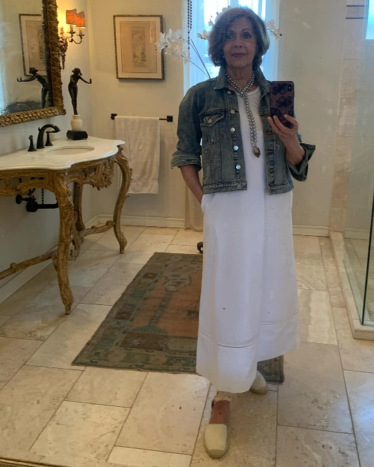 White maxi dress with cropped denim jacket cute outfit for women over 50