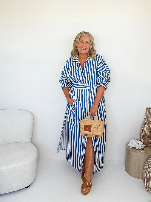 Blue striped shirt dress with straw bag cute outfit for women over 50
