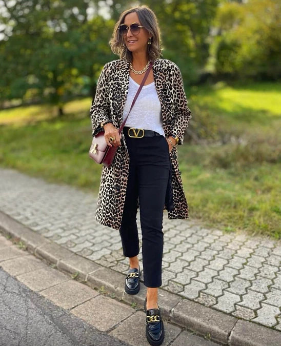 Leopard coat and black trousers trendy outfit for women over 50