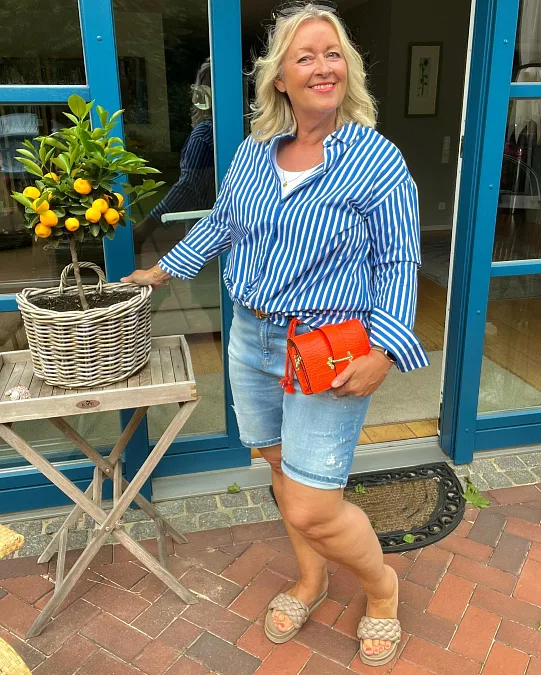 Striped shirt and denim shorts casual outfit for women over 50