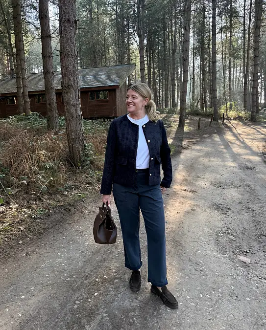 Navy jacket white tee and straight pants hiking outfit for women over 50