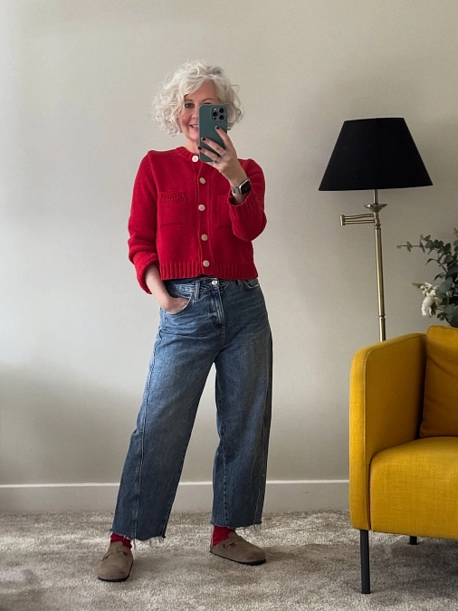 Red cropped cardigan with high-waisted jeans everyday outfit for women over 50