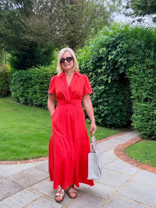 Vibrant red maxi dress with flat sandals outfit for women over 50