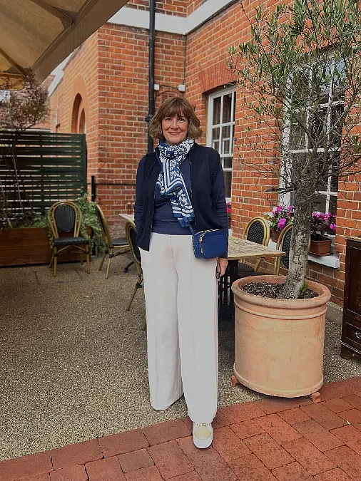 Classic navy and white layered casual outfit for women over 50