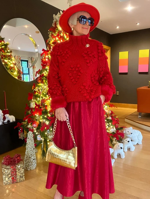 Tonal red knit and satin skirt Christmas outfit for women over 50