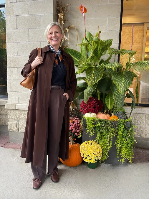 Chocolate brown layers and wide-leg trousers fall outfit