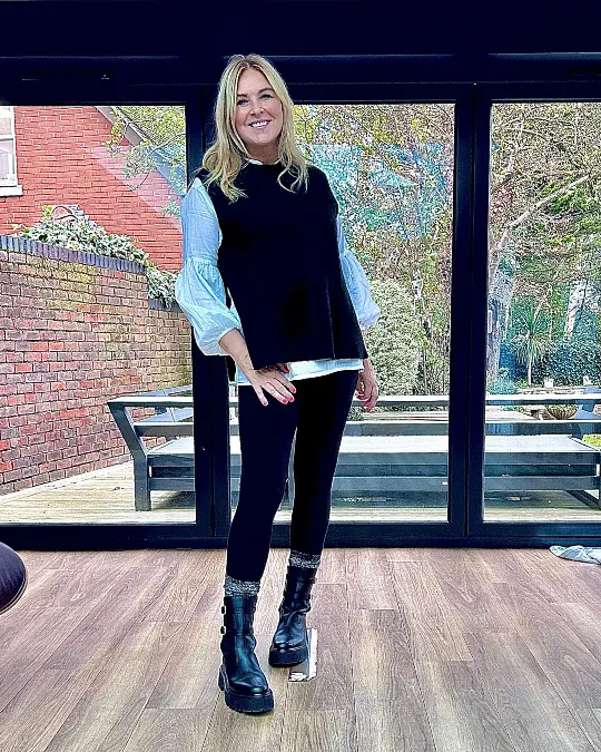 Black knit vest and statement sleeves fall outfit