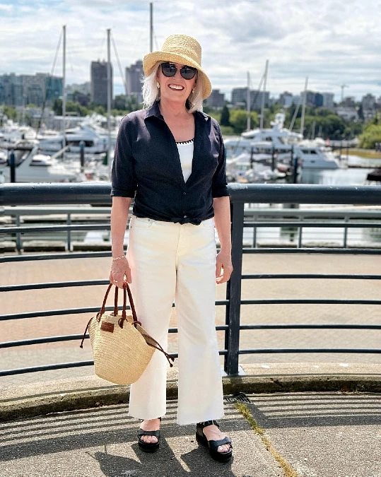 Tied navy shirt and white jeans casual outfit for women over 50