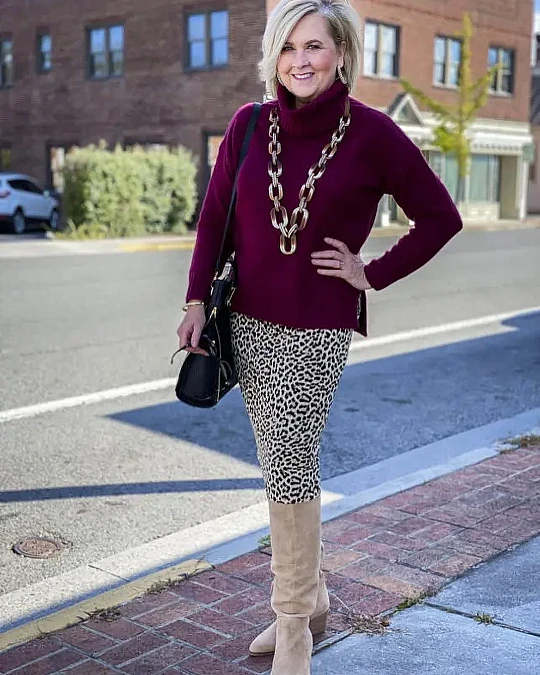 Burgundy turtleneck leopard pants and tall boots Thanksgiving outfit