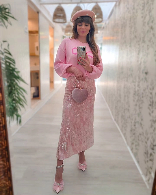 Pink knit and sequin midi skirt Valentine’s Day outfit for women over 50