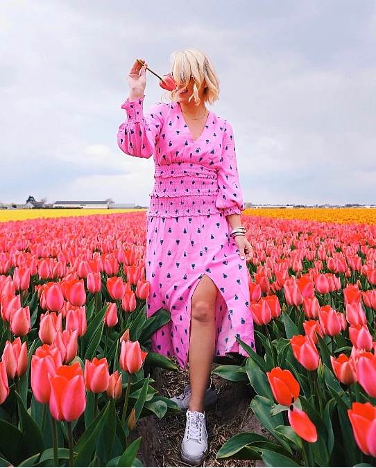 Pink printed midi dress with sneakers for Valentine’s Day outfits over 50
