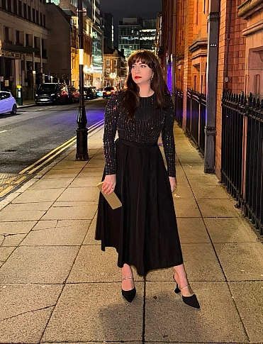 Black sparkle top with full skirt New Year's Eve outfit