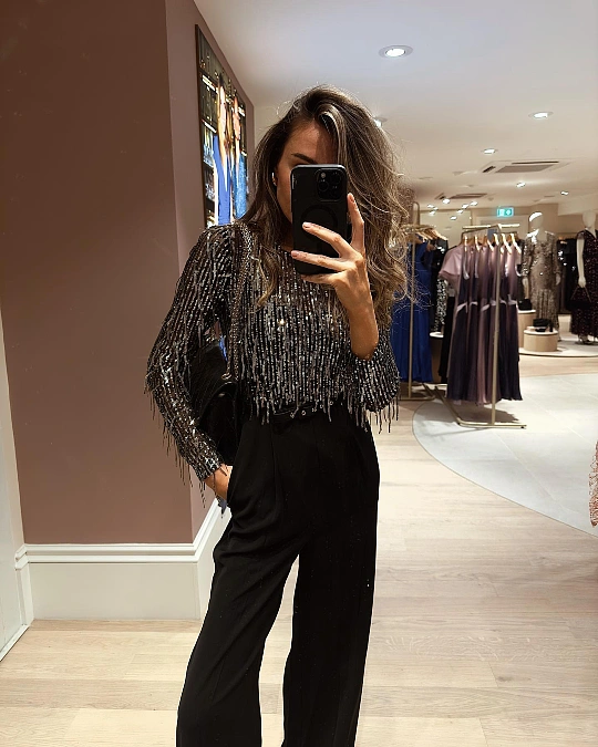 Beaded fringe top with black trousers New Year's Eve outfit