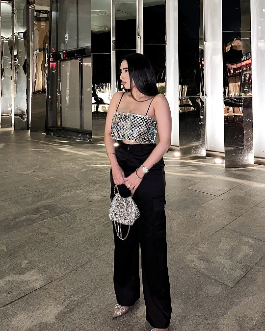 Mirror sequin top with black trousers New Year's Eve outfit