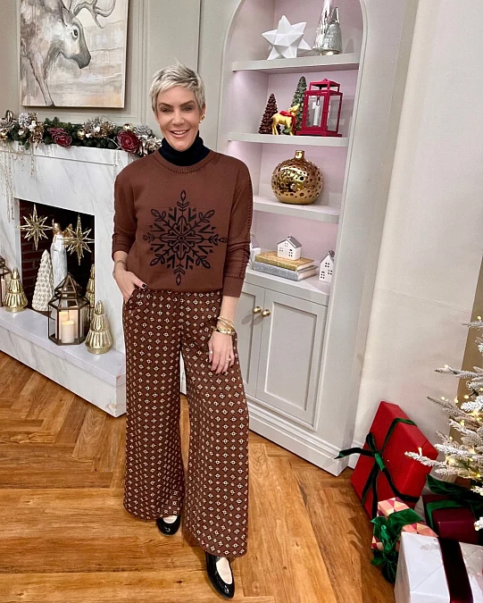 Chocolate knit sweater and printed wide-leg pants winter work outfit for women over 50