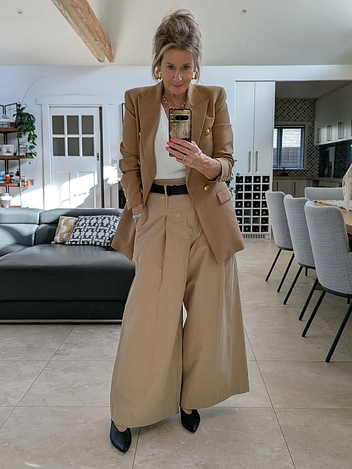 Camel blazer and wide-leg trousers winter work outfit for women over 50