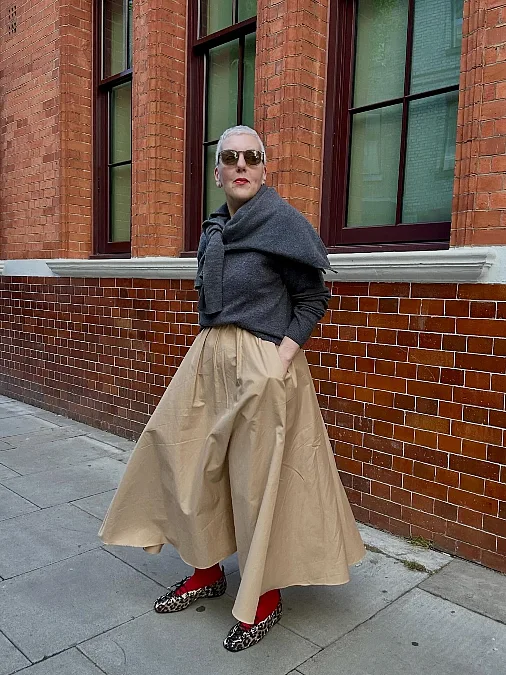 Charcoal knit and camel skirt winter work outfit for women over 50