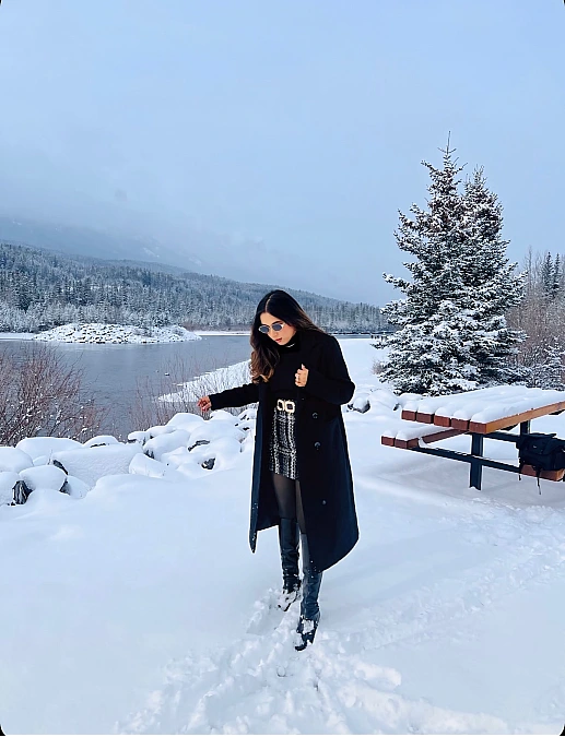 Black coat and sequined skirt snowbird outfit for women over 50