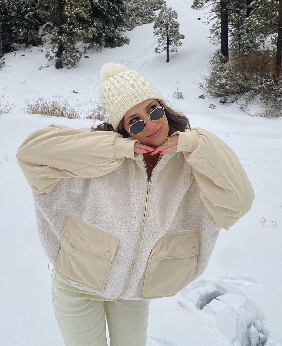 Cream sherpa jacket and soft neutral snowbird outfit for women over 50