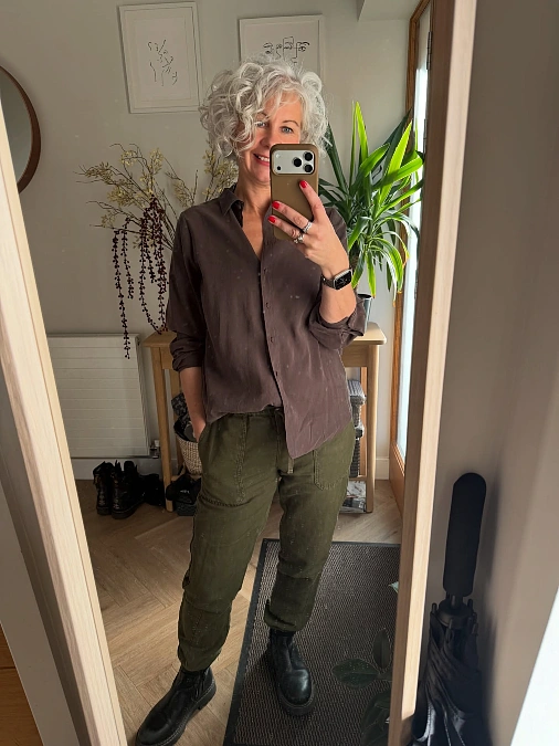 Chocolate shirt and olive utility pants holiday outfit for women over 50