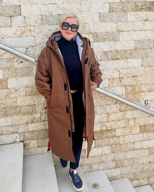 Long brown coat with navy basics winter holiday outfit for women over 50
