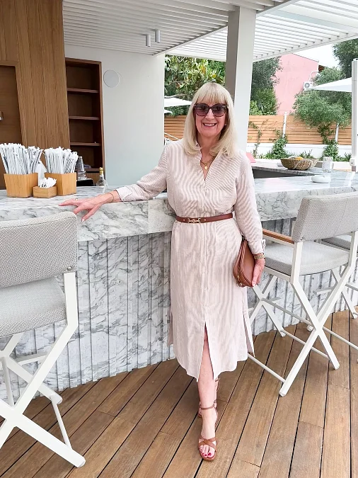 Soft neutral shirt dress holiday outfit for women over 50