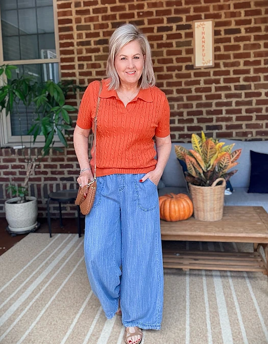 Rust knit and wide-leg denim autumn outfit for women over 50