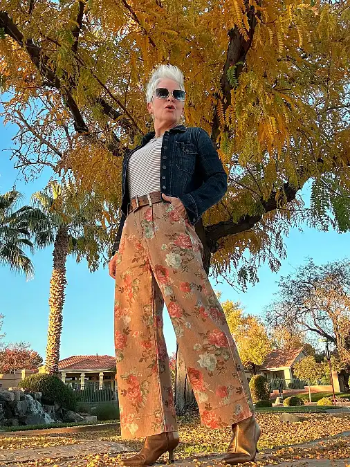 Floral trousers and denim jacket fall outfit for women over 50