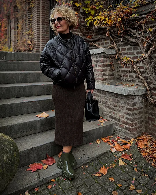 Black puffer and chocolate knit skirt autumn outfit for women over 50